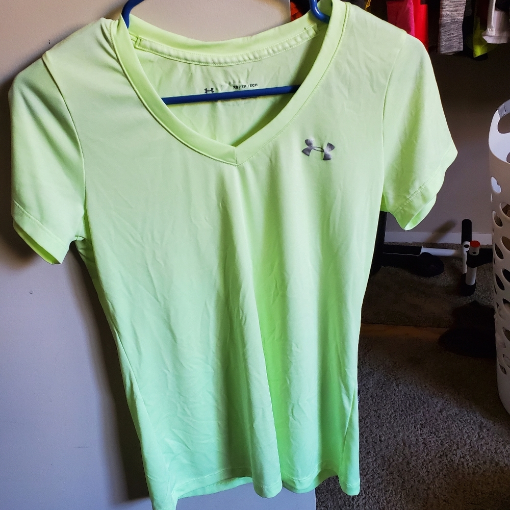Under Armour shirt and Nike sports bra